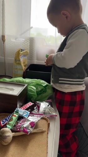 Toddler plays with toys during morning hours in Odintsovo