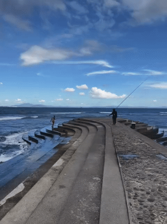 Early morning fishing activity observed on Senggigi pier