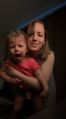 Woman takes selfies, dances with child in Reshetnikovo home