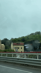 Morning moments captured in Sochi, woman poses while man drives