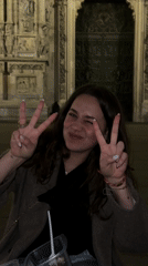 Young woman celebrates birthday at Milan Cathedral steps