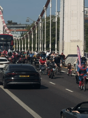 Costumed cyclists cause London bridge traffic during organized ride
