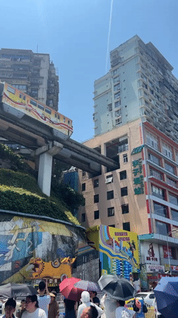 Chongqing's monorail threads straight through a residential building