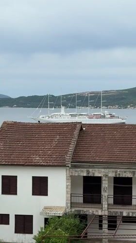 Cruise ship spotted off Montenegro coast from residential overlook
