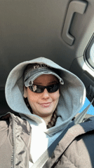 Young person records selfie video inside car in Krasnoyarsk