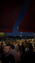 Evening outdoor party with DJ draws dancing crowd in Moscow