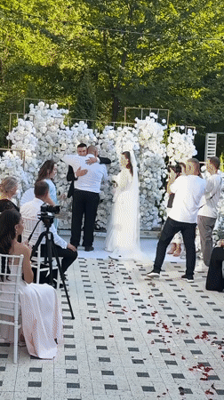 Outdoor wedding ceremony with live electric violin in Seliște, Moldova