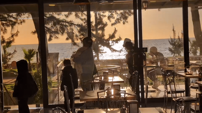 Golden hour dining experience captured at seaside Kobuleti restaurant