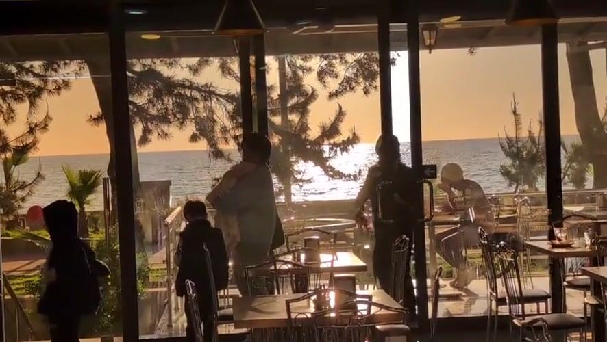 Golden hour dining experience captured at seaside Kobuleti restaurant