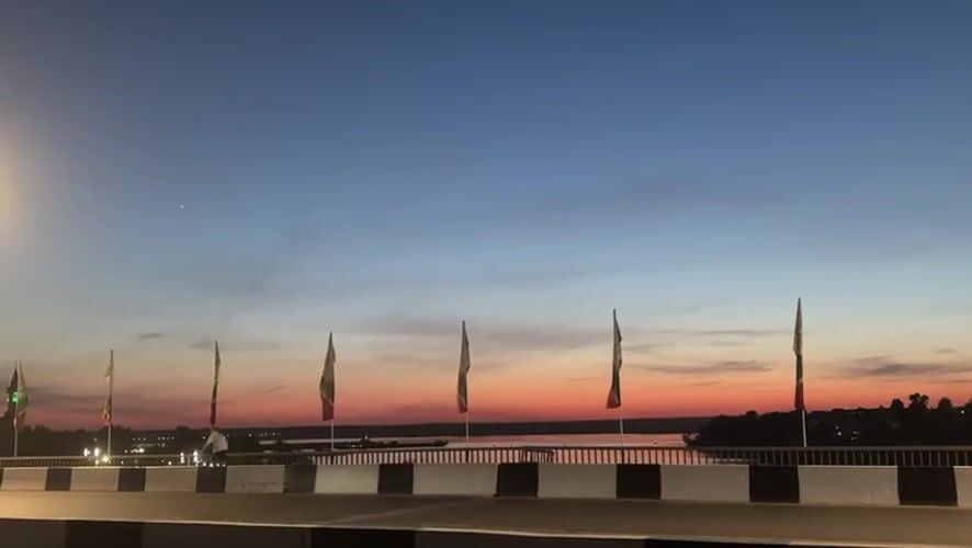 Evening bridge views capture twilight and nighttime Naberezhnye Chelny