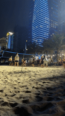 Beach volleyball and restaurant dining captured in Da Nang