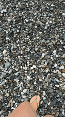 Rocky beach morning in Giachrypsh, Abkhazia — waves, selfies, pebbles.