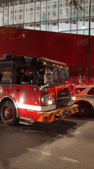 Multiple emergency vehicles respond to a nighttime Montreal incident