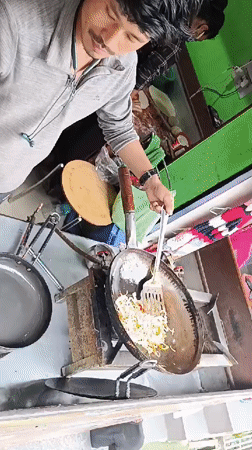 Morning food preparation and dining captured in Vashisht village
