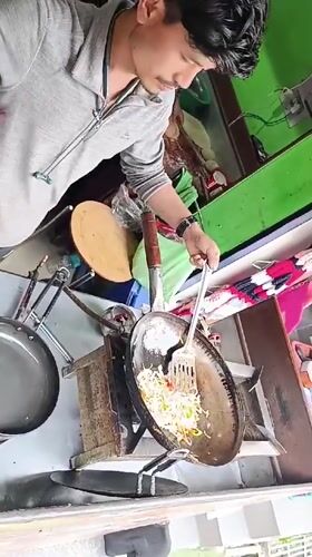 Morning food preparation and dining captured in Vashisht village