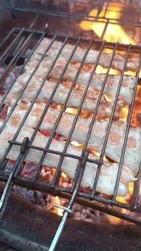 Afternoon backyard barbecue documented in Viadana, Italy