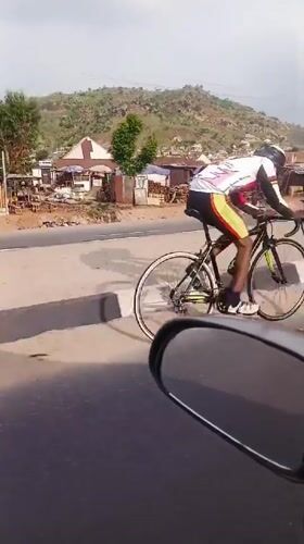 Cyclist spotted riding road bike in Dam Camp, Nigeria