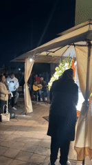 Nighttime gathering and church interior documented in Cholula