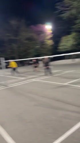 Evening badminton game draws players to lit Stara Zagora court