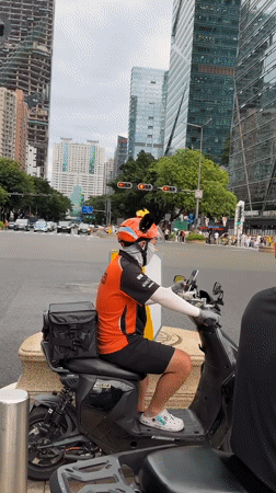 Futian District streets and skyline on a regular weekday morning