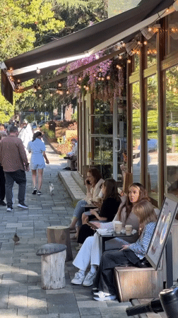 Sunny afternoon cafe life captured across Sochi's outdoor spaces