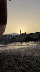 Sunset swim off Budva's pebble beach, Montenegro