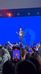 Woman performs for large crowd in Buenos Aires