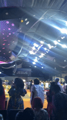 Church service with music and congregation in Ado, Nigeria