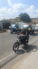 Decorated municipal vehicle procession travels through Tinaquillo, Venezuela