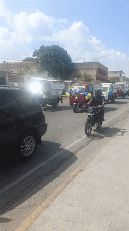 Decorated municipal vehicle procession travels through Tinaquillo, Venezuela