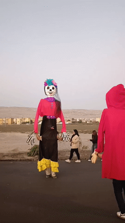 Colorful festival parade rolls through the streets of Arica