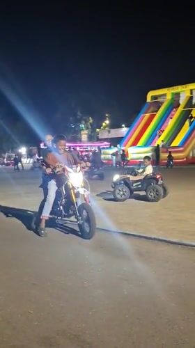 Nighttime carnival draws families in Lhokseumawe, Indonesia