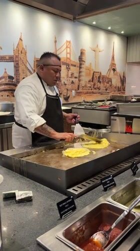 Skilled flat-top grill work at a Punta Sam kitchen station