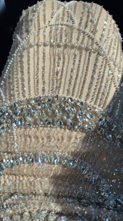 Beaded dress, Netflix signage captured in Mandelieu-la-Napoule footage
