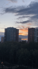 Dusk residential scene with apartment buildings captured on video