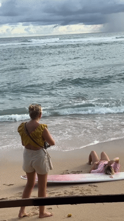 Women photographing on Ahangama beach, Sri Lanka