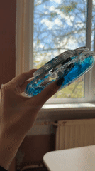 Person handles decorative ship objects, plays music in Saint Petersburg