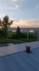 Sunset view captured from rusty rooftop in Tara, Russia