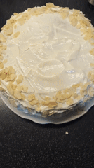 Decorated cakes with white frosting captured in multiple views
