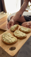 Man enjoys green toast spread breakfast in Sofia