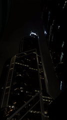 Night view of illuminated skyscrapers captured in Khimki