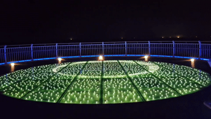 Oryukdo Skywalk glows with green lights in Busan night