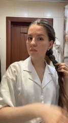 Woman documents morning routine in Klin, Russia bathroom
