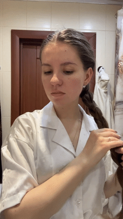 Woman documents morning routine in Klin, Russia bathroom