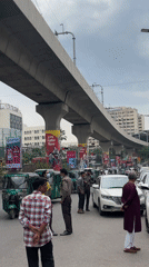 Morning street life documented around Dhaka metro rail system