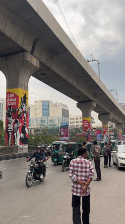 Morning street life documented around Dhaka metro rail system