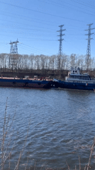 Barge traffic documented on Kama River near Chaikovsky, Russia