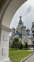 Tourist photographs St. Michael's Cathedral in Izhevsk, Russia