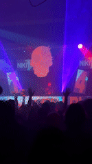 DJ performs at crowded Barcelona nightclub under NIKITA branding