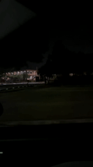 Car approaches building at night in San Andrés Cholula